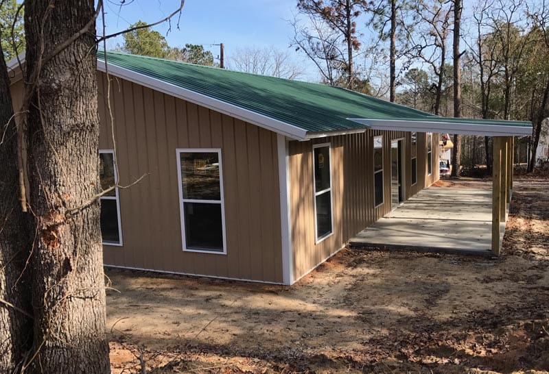 a-quality-pole-building-home2 A Quality Pole Building brown with green roof | Gilbert, SC
